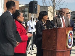 Prince George's County Executive Angela Alsobrooks speaks to the crowd on the importance of affordable housing in the County in from of The Lewis Apartments.